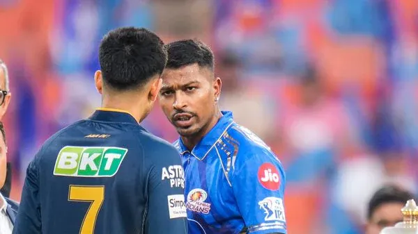 Crowd waving team flags during IPL game
